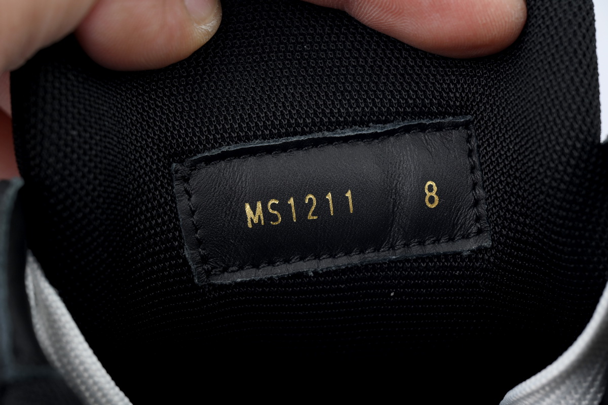Louis Vuitton Sneaker Black Skin And White Background